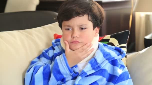 Sick child with neck brace — Stock Footage Sick child with neck brace Video Clip