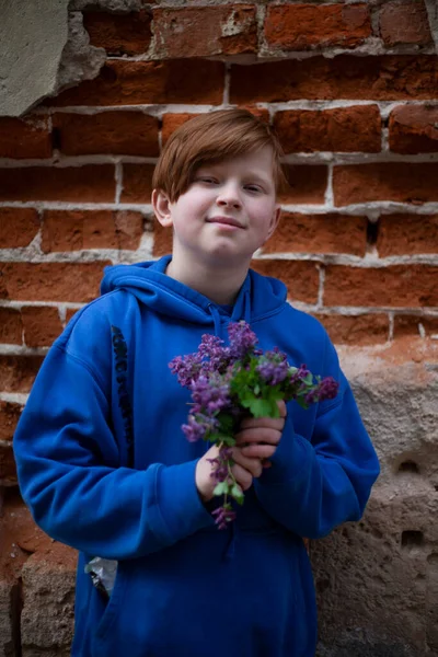 Boy Red Hair Blue Sweatshirt Bouquet Purple Wildflowers — Stock Photo, Image