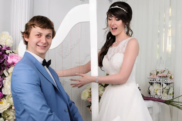 Portrait of funny Couple. Wedding dress. Wedding accessories — Stock Photo, Image