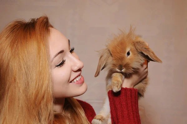 Portrait of girl and rabbit — Stock Photo, Image