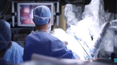 Cerrahi operasyon robotu. Tıbbi robot. Robot Cerrahi. Minimum İstilacı Robot Cerrahi. Robotla ilgili tıbbi işlem.