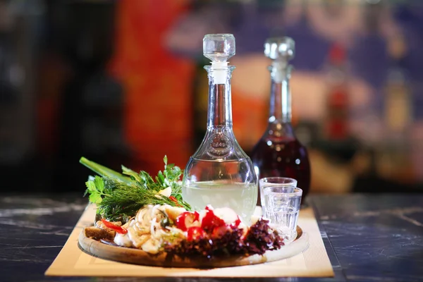 Horseradish vodka and snack vegetables — Stock Photo, Image