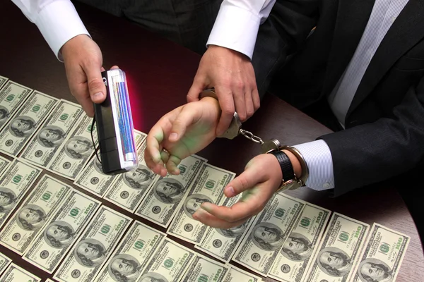 bribe. arrested for bribery. caught red-handed - Stock Image