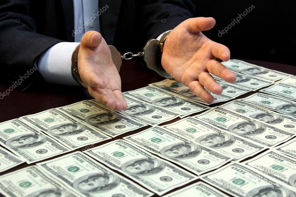 bribe. arrested for bribery. caught red-handed - Stock Image