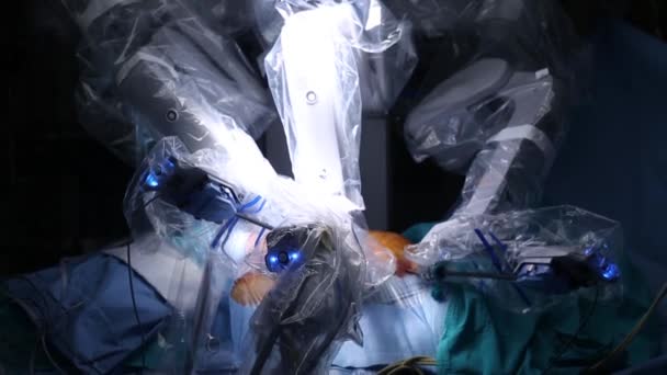 Surgical operation robot. Robotic Surgery. Medical robot da Vinci. Medical operation involving robot - Stock Footage — Wideo stockowe