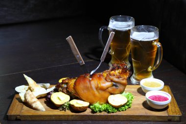 Shank beer. Pork knuckle baked in the oven - Stock Image