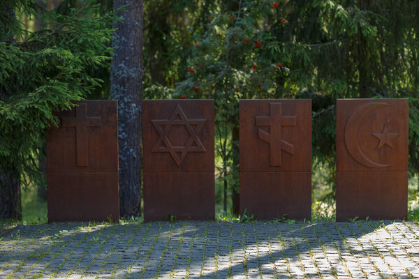 signs of religions from the memorial in Katyn in memory of the killed Polish soldiers and officers