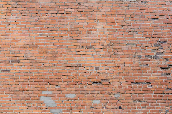 old red brick wall,shot on a Sunny spring day