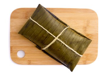 Tipik Meksika yemeği, Veracruz veya jarochos tamale, muz yaprağı, mısır unu ve kırmızı adobo ile hazırlanmış. İspanyol yemekleri, yani, İspanyolların Amerika 'ya gelişinden beri hazırlanan yemekler.