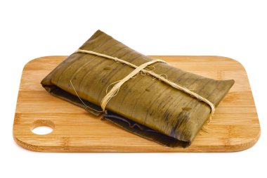 Tipik Meksika yemeği, Veracruz veya jarochos tamale, muz yaprağı, mısır unu ve kırmızı adobo ile hazırlanmış. İspanyol yemekleri, yani, İspanyolların Amerika 'ya gelişinden beri hazırlanan yemekler.