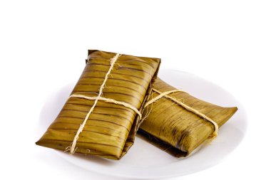 Tipik Meksika yemeği, Veracruz veya jarochos tamale, muz yaprağı, mısır unu ve kırmızı adobo ile hazırlanmış. İspanyol yemekleri, yani, İspanyolların Amerika 'ya gelişinden beri hazırlanan yemekler.