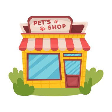 Pankartlı ve otlu evcil hayvan dükkanı binası.