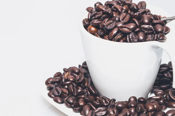 Coffee cup with coffee and a spoon — Stock Photo, Image