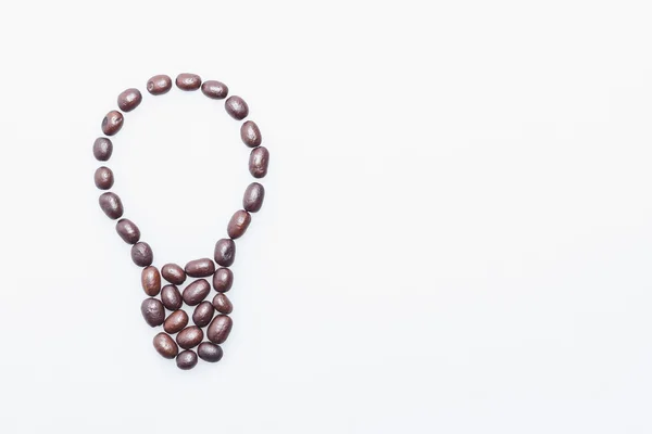 Coffee beans lightbulb symbol — Stock Photo, Image