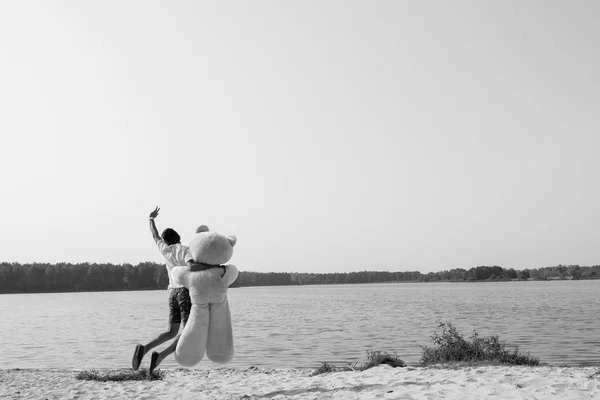 Guy with a big teddy bear