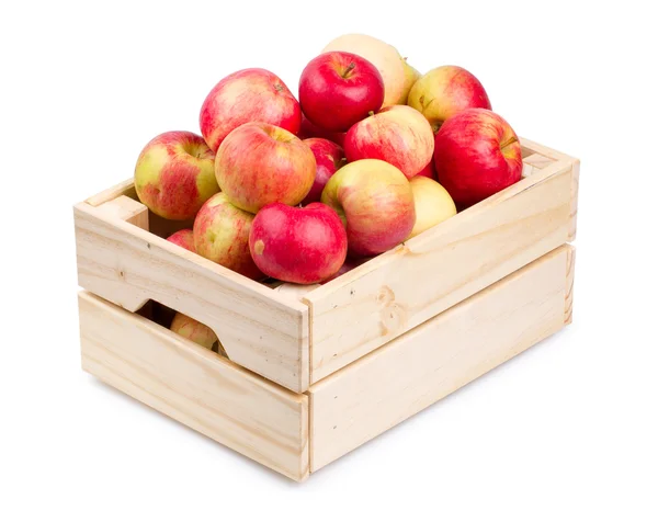 Wooden box full of fresh apples isolated — Stock Photo, Image