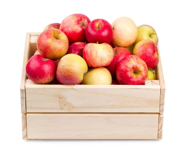 Wooden box full of fresh apples isolated — Stock Photo, Image