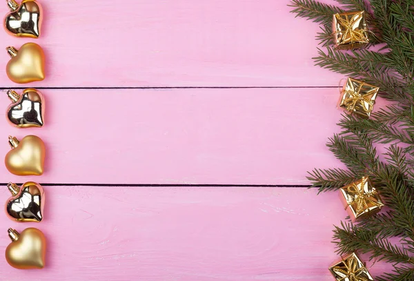 Decoración navideña sobre fondo rosa para tu texto — Foto de Stock