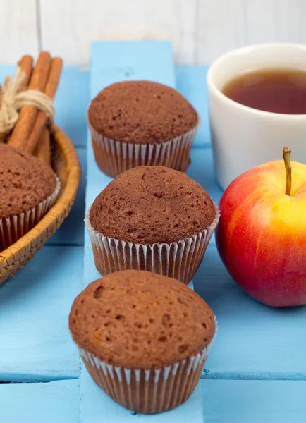 Chocolate cakes, tea and apples — Stock Photo, Image