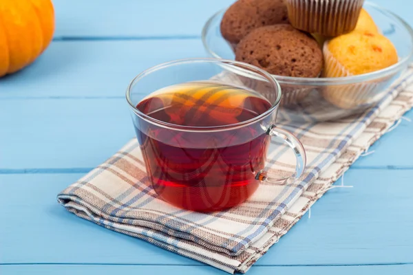 Tea and cakes on a napkin — Stock Photo, Image