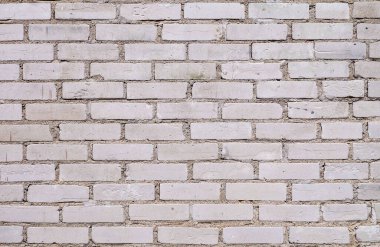 Kentsel konut duvarının arka planında hafif duvar tuğlası var. doku