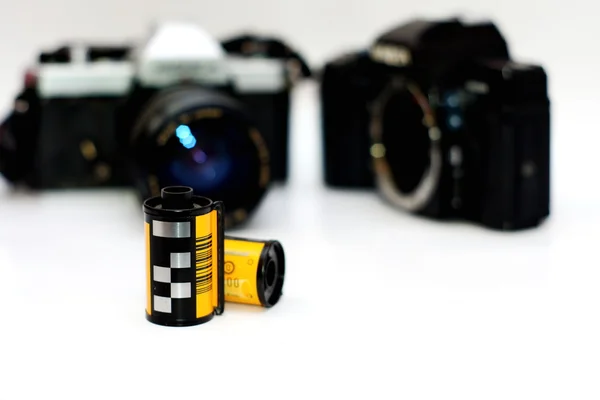 35mm Film rolls and film camera — ストック写真