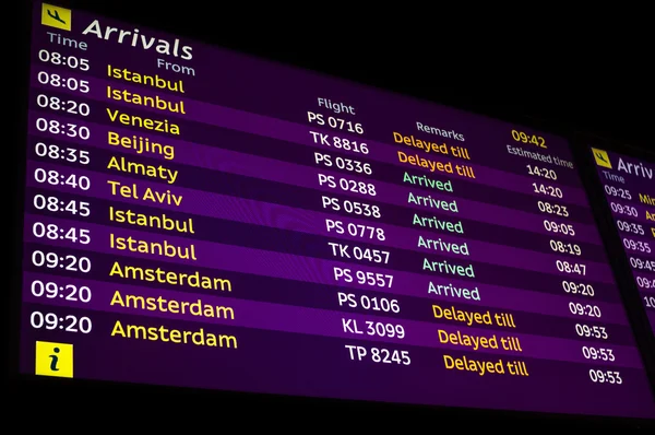 Arrivals Information Board in Airport — Stock Photo, Image