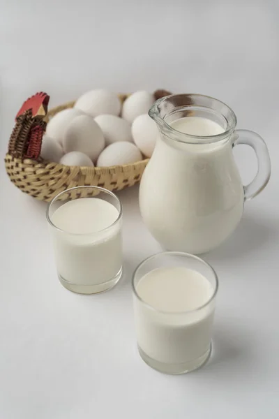 Milk and eggs.Glass of milk.