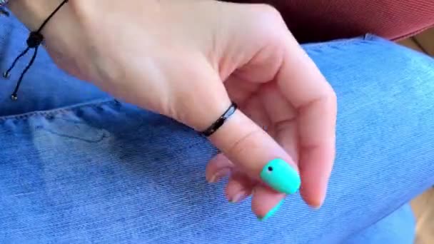 Womans hands with trendy turquoise nail design — Stock Video