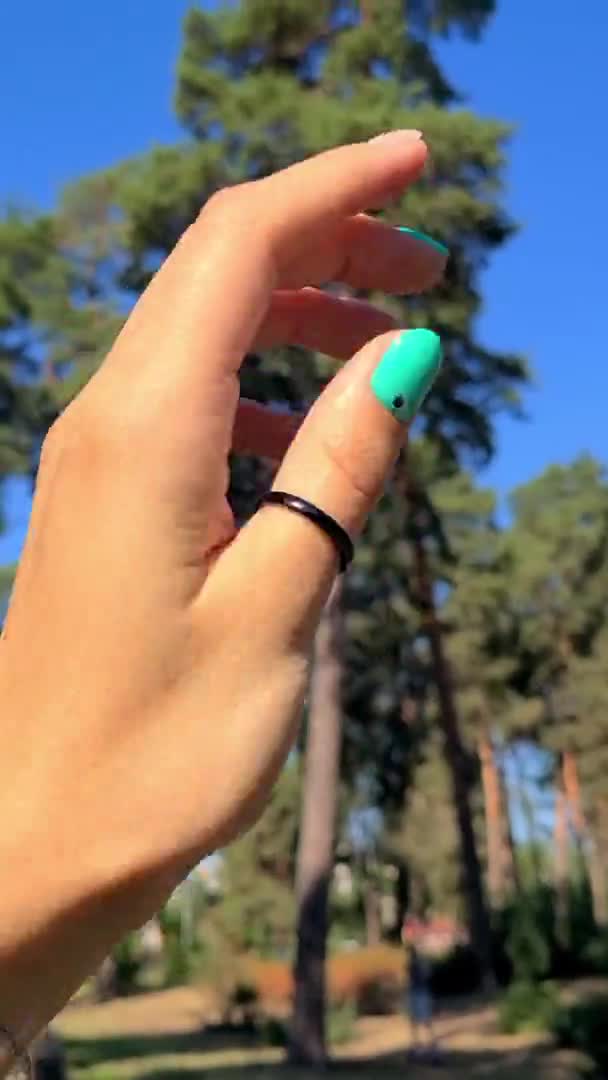 Womans hands with trendy turquoise nail design — Stock Video