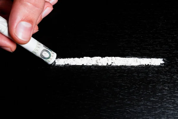 Cocaína e dinheiro na mesa — Fotografia de Stock