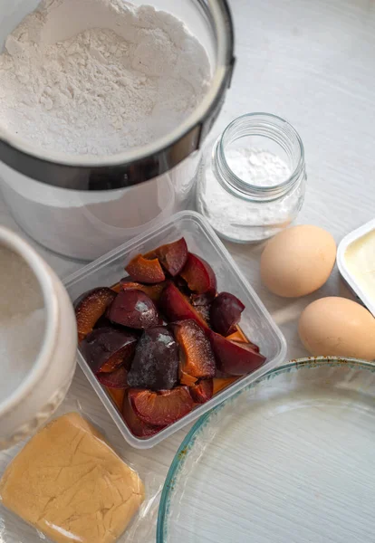 Cake Baking Plums Chicken Eggs Marzipan Cream Cheese Table Flour — Stock Photo, Image