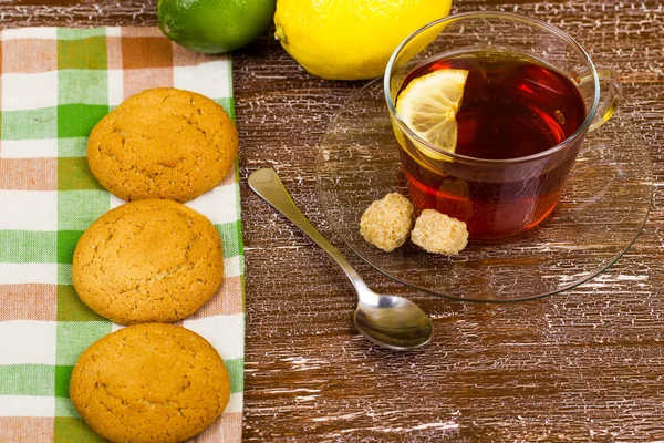 Лимон, чай, вівсяне печиво, цукор — стокове фото