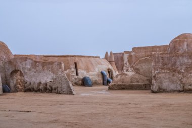 Exterior view of the original film set used in Star Wars as Mos Eisly space port clipart