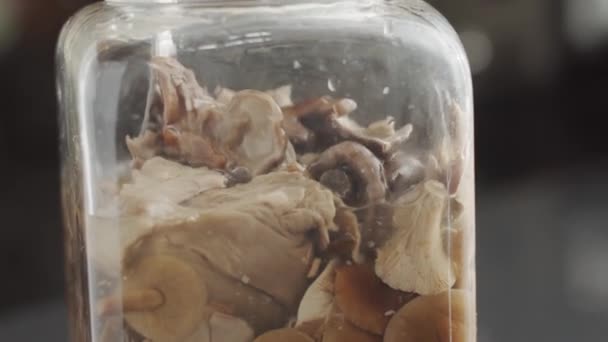 Tilt View Chef Taking Preserved Mushrooms Scoop Jar While Cooking — Stock Video
