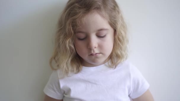 Disappointed Little Child Casual Shirt Looking Camera White Background Studio — Stock Video