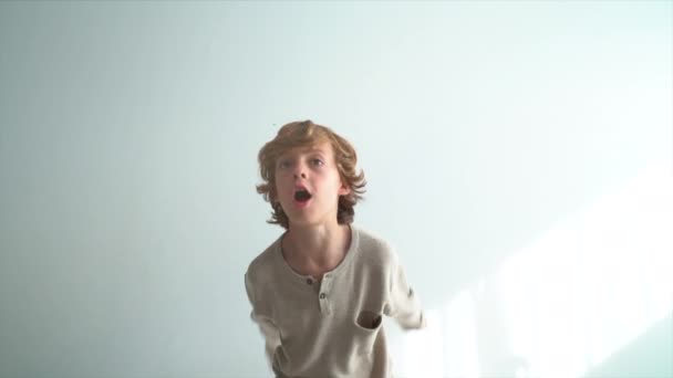 Overjoyed Boy Having Fun Confetti Home — Stock Video