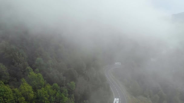 Bus Driving Foggy Mountain Road — Stock Video