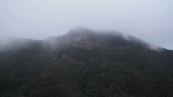 Picturesque Aerial View Winding Mountain Road Clouds Foggy Windy Day — kuvapankkivideo