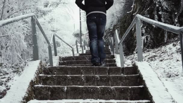 Unrecognizable Man Walking Frozen Steps — Stockvideo