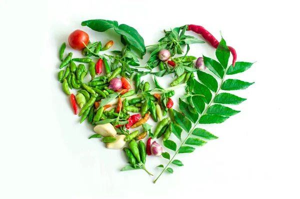 Group of Herbs and Spices Mixed Creating a Heart Love Shape