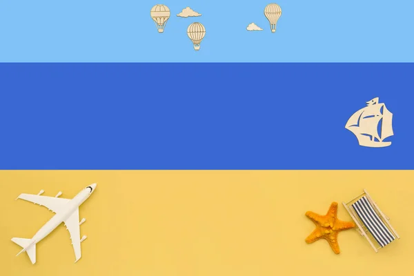 Plane, sailboat, air balloons and sun lounger on a colored background top view. Travel background for travel agency, poster. Flat lay view.