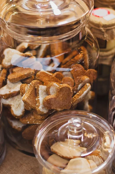 Closeup of chocolate cookies in jar on wooden table