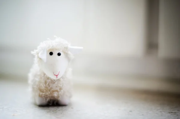 Closeup of funny white sheep puppet