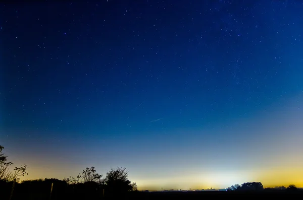 夜空の星背景光 — ストック写真