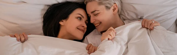 Top View Happy Lesbian Couple Lying Bed Blanket Banner — Stock Photo, Image
