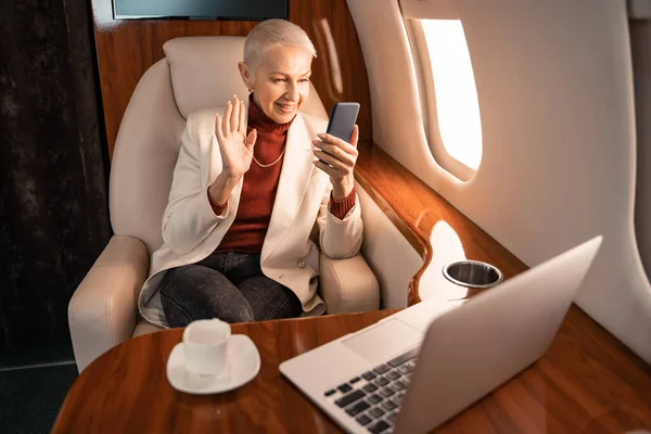 Businesswoman Having Video Call Smartphone Coffee Laptop Jet — Stock Photo, Image