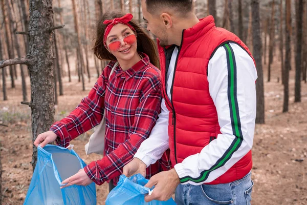 Happy Couple Trash Bags Looking Each Other Forest — Stock Photo, Image