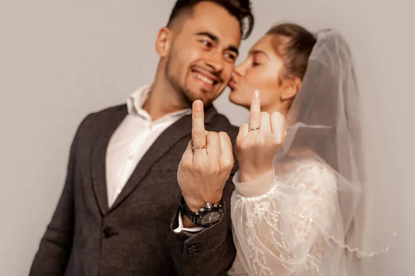 Blurred Newlyweds Showing Wedding Rings Fingers Isolated Grey — Stock Photo, Image