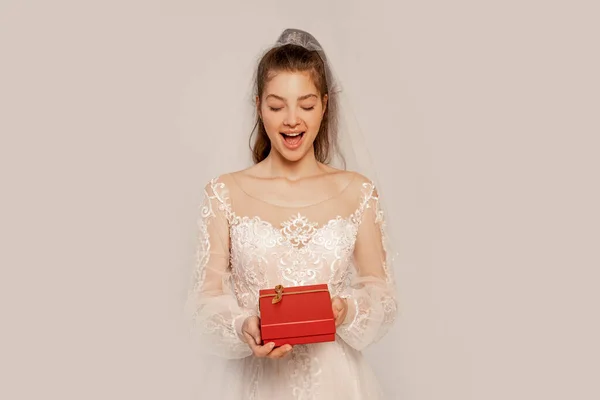 Amazed Bride Holding Gift Box Isolated Grey Lilac Shade — Stock Photo, Image